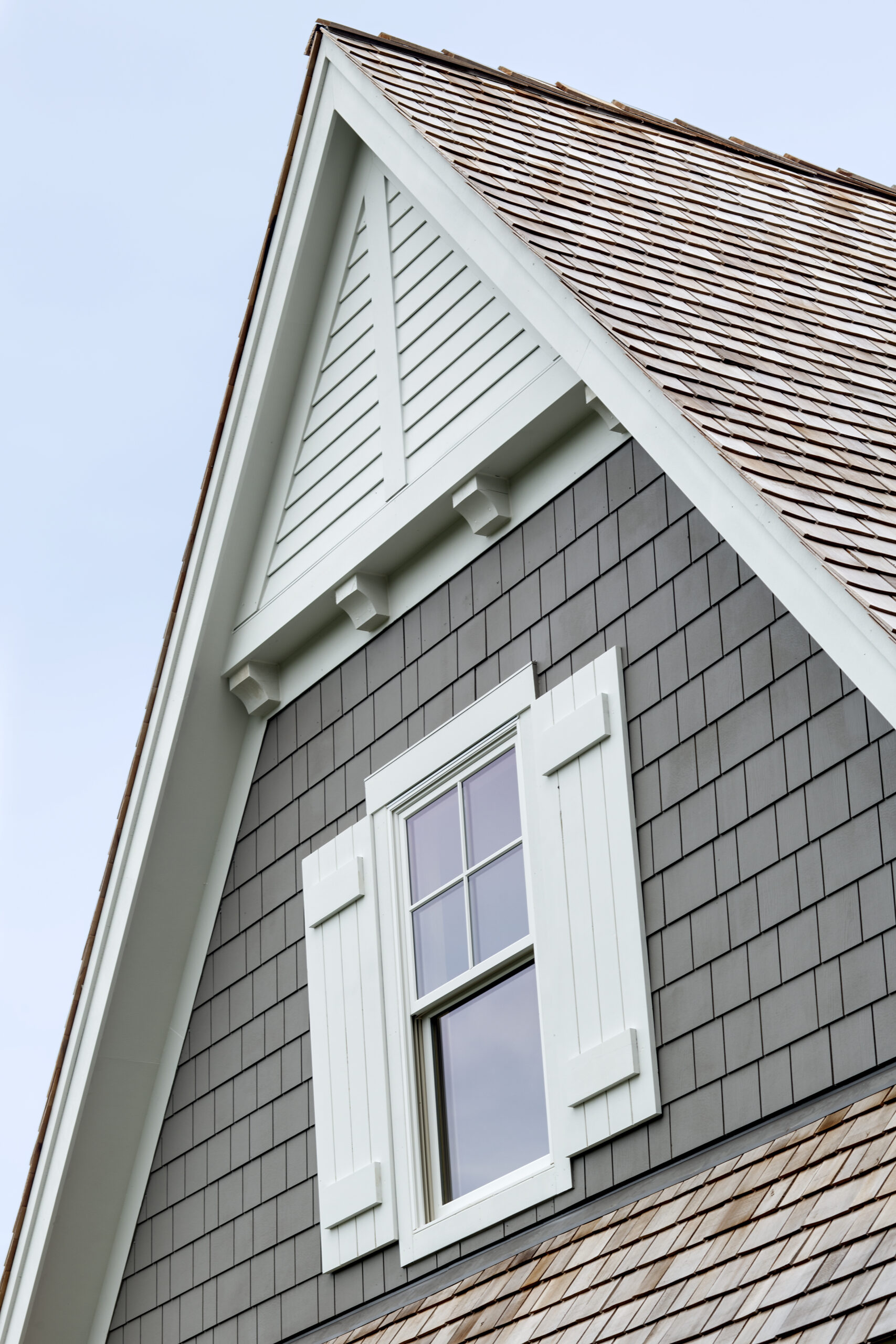 James Hardie Light Mist shingle siding with Arctic White trim and Alside vinyl windows on a home exterior